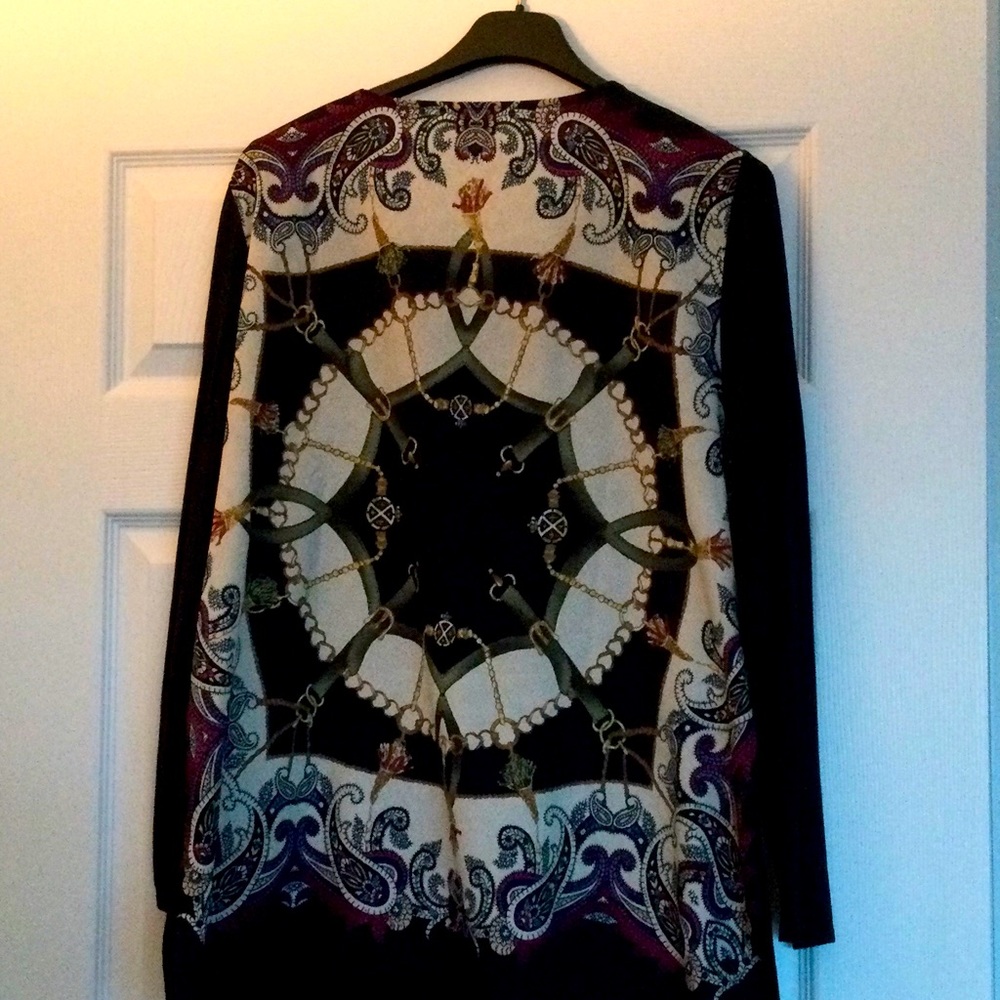 Chicos size 3 (size 16-18). Colorful print in back with solid black knit front